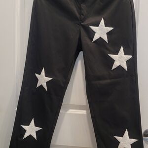 Black Pants with White Star Accents
